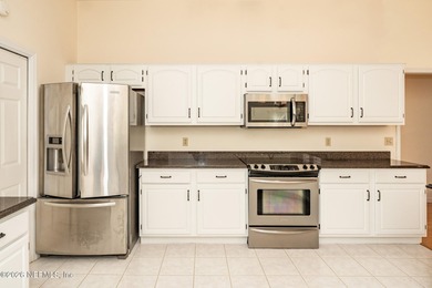 Beautifully maintained one story, 3 bedroom,2 bathroom home on Jacksonville Golf and Country Club in Florida - for sale on GolfHomes.com, golf home, golf lot