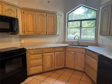 Great curb appeal on this 3BD-3BA Golf Course Home at Holly Lake on Holly Lake Ranch Golf Club in Texas - for sale on GolfHomes.com, golf home, golf lot