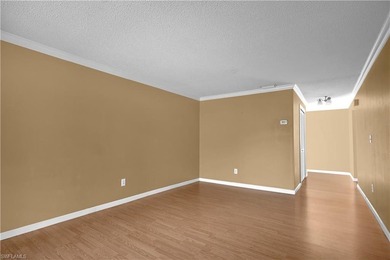 Welcome to easy Florida living at this perfectly located 1/1 on Cypress Lake Country Club in Florida - for sale on GolfHomes.com, golf home, golf lot