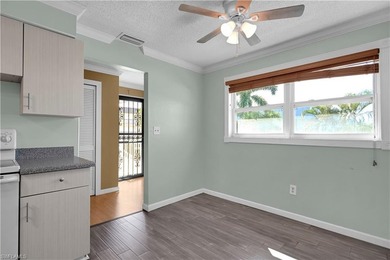 Welcome to easy Florida living at this perfectly located 1/1 on Cypress Lake Country Club in Florida - for sale on GolfHomes.com, golf home, golf lot