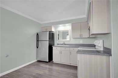 Welcome to easy Florida living at this perfectly located 1/1 on Cypress Lake Country Club in Florida - for sale on GolfHomes.com, golf home, golf lot