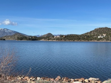 This beautiful sloping lot with in your-face-views of Lake on Lake Shastina Golf Course in California - for sale on GolfHomes.com, golf home, golf lot