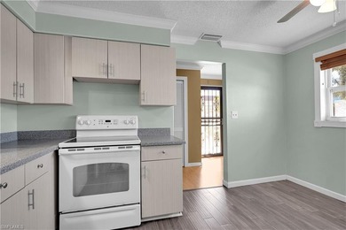 Welcome to easy Florida living at this perfectly located 1/1 on Cypress Lake Country Club in Florida - for sale on GolfHomes.com, golf home, golf lot