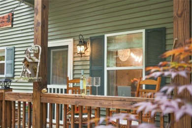 Immersed in tranquility, this three-bedroom, three-bathroom on Sapphire National Golf Club in North Carolina - for sale on GolfHomes.com, golf home, golf lot