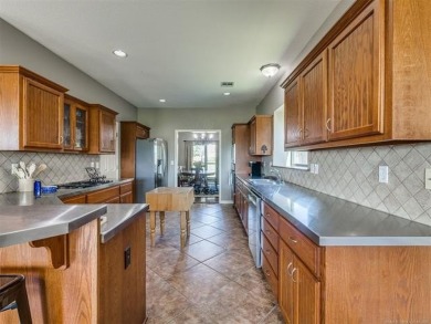 Welcome to this beautiful 4-bedroom, 3.5 bath home in the highly on  in Oklahoma - for sale on GolfHomes.com, golf home, golf lot