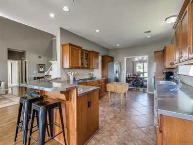 Welcome to this beautiful 4-bedroom, 3.5 bath home in the highly on  in Oklahoma - for sale on GolfHomes.com, golf home, golf lot