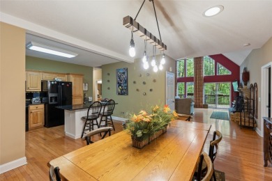 Immersed in tranquility, this three-bedroom, three-bathroom on Sapphire National Golf Club in North Carolina - for sale on GolfHomes.com, golf home, golf lot