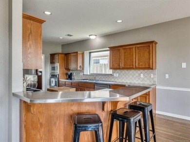 Welcome to this beautiful 4-bedroom, 3.5 bath home in the highly on  in Oklahoma - for sale on GolfHomes.com, golf home, golf lot