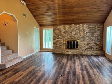 Great curb appeal on this 3BD-3BA Golf Course Home at Holly Lake on Holly Lake Ranch Golf Club in Texas - for sale on GolfHomes.com, golf home, golf lot