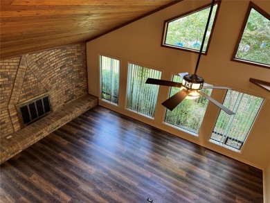 Great curb appeal on this 3BD-3BA Golf Course Home at Holly Lake on Holly Lake Ranch Golf Club in Texas - for sale on GolfHomes.com, golf home, golf lot