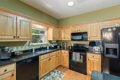 Immersed in tranquility, this three-bedroom, three-bathroom on Sapphire National Golf Club in North Carolina - for sale on GolfHomes.com, golf home, golf lot