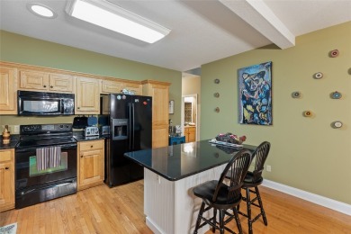 Immersed in tranquility, this three-bedroom, three-bathroom on Sapphire National Golf Club in North Carolina - for sale on GolfHomes.com, golf home, golf lot