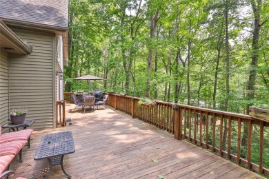 Immersed in tranquility, this three-bedroom, three-bathroom on Sapphire National Golf Club in North Carolina - for sale on GolfHomes.com, golf home, golf lot