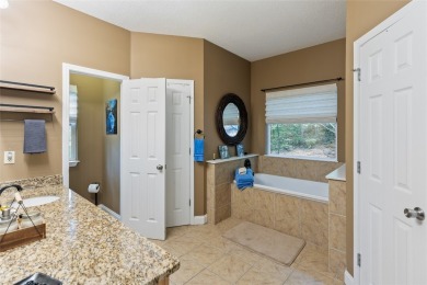 Immersed in tranquility, this three-bedroom, three-bathroom on Sapphire National Golf Club in North Carolina - for sale on GolfHomes.com, golf home, golf lot