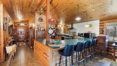 Charming Log Home (with 4 adjoining parcels for over 1 acre of on Hardwoods Golf Club At Mille Lacs in Minnesota - for sale on GolfHomes.com, golf home, golf lot