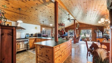 Charming Log Home (with 4 adjoining parcels for over 1 acre of on Hardwoods Golf Club At Mille Lacs in Minnesota - for sale on GolfHomes.com, golf home, golf lot