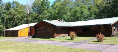 Charming Log Home (with 4 adjoining parcels for over 1 acre of on Hardwoods Golf Club At Mille Lacs in Minnesota - for sale on GolfHomes.com, golf home, golf lot