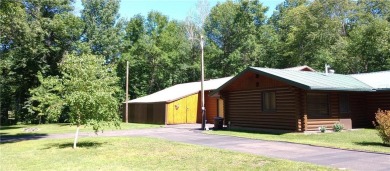 Charming Log Home (with 4 adjoining parcels for over 1 acre of on Hardwoods Golf Club At Mille Lacs in Minnesota - for sale on GolfHomes.com, golf home, golf lot