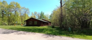 Charming Log Home (with 4 adjoining parcels for over 1 acre of on Hardwoods Golf Club At Mille Lacs in Minnesota - for sale on GolfHomes.com, golf home, golf lot