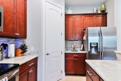 Welcome to 2557 Pete Dye Dr #505, a stunning three-story on Barefoot Resort and Golf Club  in South Carolina - for sale on GolfHomes.com, golf home, golf lot