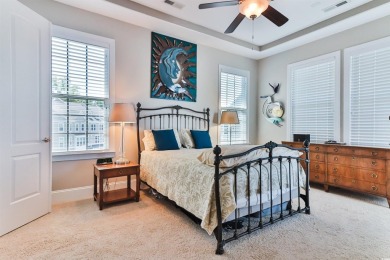 Welcome to 2557 Pete Dye Dr #505, a stunning three-story on Barefoot Resort and Golf Club  in South Carolina - for sale on GolfHomes.com, golf home, golf lot
