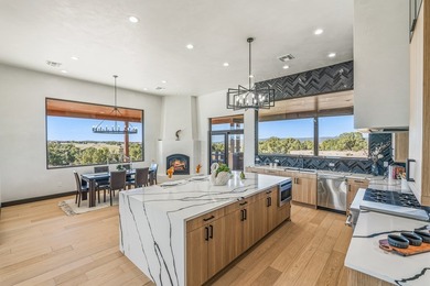 Defining Santa Fe luxury, this brand-new custom estate by on The Club At Las Campanas  in New Mexico - for sale on GolfHomes.com, golf home, golf lot