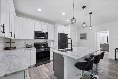 Welcome to this beautifully crafted TURNKEY duplex, offering on Rotonda Golf and Country Club The Palms Course in Florida - for sale on GolfHomes.com, golf home, golf lot