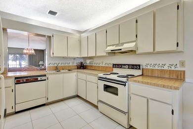 PRICED TO SELL! A Must See! Don't miss this light and bright on Martin County Golf Course in Florida - for sale on GolfHomes.com, golf home, golf lot