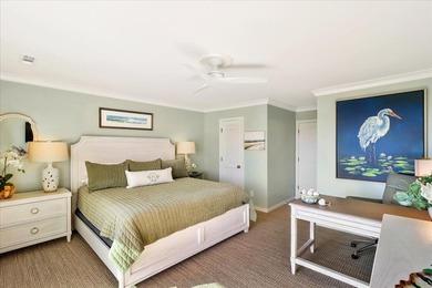 57 Beach Club Villa offers refined oceanfront living in the on Wild Dunes Harbor Golf Resort in South Carolina - for sale on GolfHomes.com, golf home, golf lot