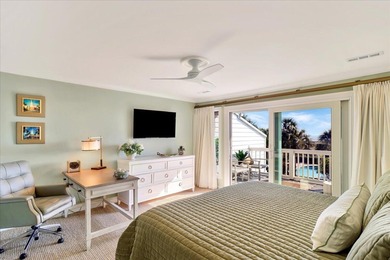 57 Beach Club Villa offers refined oceanfront living in the on Wild Dunes Harbor Golf Resort in South Carolina - for sale on GolfHomes.com, golf home, golf lot