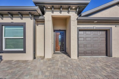 Welcome to this beautifully crafted TURNKEY duplex, offering on Rotonda Golf and Country Club The Palms Course in Florida - for sale on GolfHomes.com, golf home, golf lot