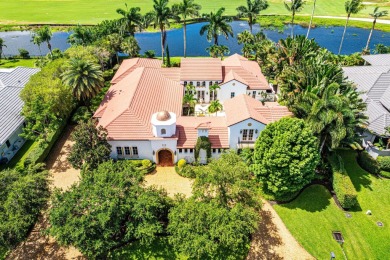 This custom built 4 bedroom, 4.5 bath exquisite courtyard home on Old Marsh Golf Club in Florida - for sale on GolfHomes.com, golf home, golf lot