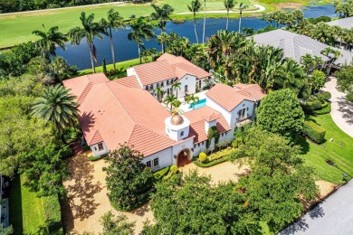 This custom built 4 bedroom, 4.5 bath exquisite courtyard home on Old Marsh Golf Club in Florida - for sale on GolfHomes.com, golf home, golf lot