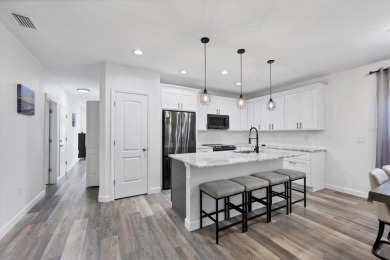 Welcome to this beautifully crafted TURNKEY duplex, offering on Rotonda Golf and Country Club The Palms Course in Florida - for sale on GolfHomes.com, golf home, golf lot