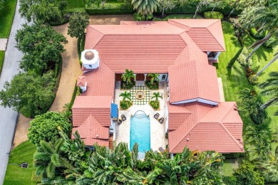This custom built 4 bedroom, 4.5 bath exquisite courtyard home on Old Marsh Golf Club in Florida - for sale on GolfHomes.com, golf home, golf lot