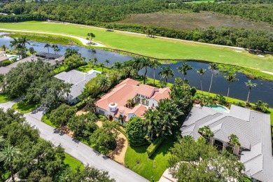 This custom built 4 bedroom, 4.5 bath exquisite courtyard home on Old Marsh Golf Club in Florida - for sale on GolfHomes.com, golf home, golf lot
