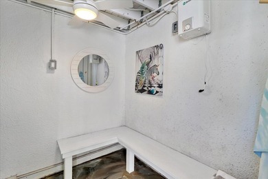 57 Beach Club Villa offers refined oceanfront living in the on Wild Dunes Harbor Golf Resort in South Carolina - for sale on GolfHomes.com, golf home, golf lot