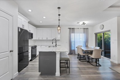 Welcome to this beautifully crafted TURNKEY duplex, offering on Rotonda Golf and Country Club The Palms Course in Florida - for sale on GolfHomes.com, golf home, golf lot