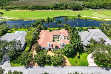 This custom built 4 bedroom, 4.5 bath exquisite courtyard home on Old Marsh Golf Club in Florida - for sale on GolfHomes.com, golf home, golf lot