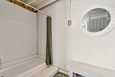 57 Beach Club Villa offers refined oceanfront living in the on Wild Dunes Harbor Golf Resort in South Carolina - for sale on GolfHomes.com, golf home, golf lot