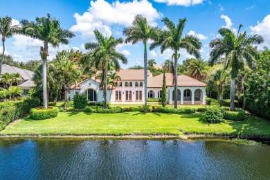 This custom built 4 bedroom, 4.5 bath exquisite courtyard home on Old Marsh Golf Club in Florida - for sale on GolfHomes.com, golf home, golf lot