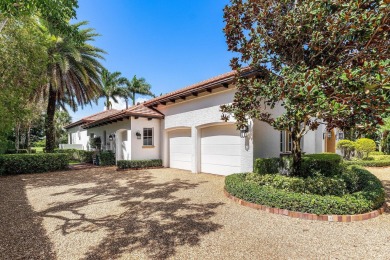 This custom built 4 bedroom, 4.5 bath exquisite courtyard home on Old Marsh Golf Club in Florida - for sale on GolfHomes.com, golf home, golf lot