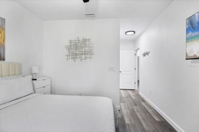 Welcome to this beautifully crafted TURNKEY duplex, offering on Rotonda Golf and Country Club The Palms Course in Florida - for sale on GolfHomes.com, golf home, golf lot