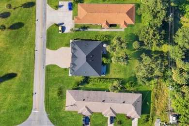 Welcome to this beautifully crafted TURNKEY duplex, offering on Rotonda Golf and Country Club The Palms Course in Florida - for sale on GolfHomes.com, golf home, golf lot