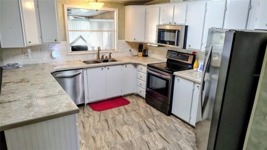 Welcome to this two bedroom two bath home located in the highly on Plantation Golf Club in Florida - for sale on GolfHomes.com, golf home, golf lot