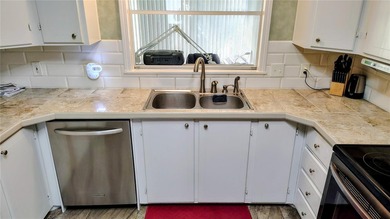 Welcome to this two bedroom two bath home located in the highly on Plantation Golf Club in Florida - for sale on GolfHomes.com, golf home, golf lot