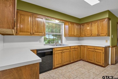 Welcome to your new home in the beautifully gated Hideaway Lake on Hide-A-Way Lake Golf Course in Texas - for sale on GolfHomes.com, golf home, golf lot