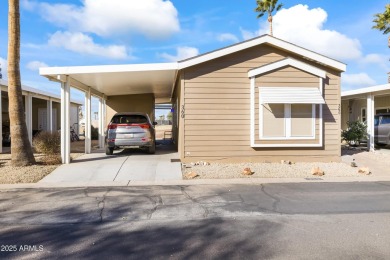 Welcome HOME! Newly remodeled 2015 Cavco nestled on the 14th on Pueblo Golf Course in Arizona - for sale on GolfHomes.com, golf home, golf lot