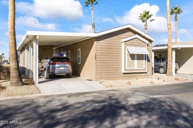 Welcome HOME! Newly remodeled 2015 Cavco nestled on the 14th on Pueblo Golf Course in Arizona - for sale on GolfHomes.com, golf home, golf lot