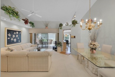 YOU'LL INSTANTLY FEEL AT HOME WHEN YOU STEP INTO THIS VAULTEDV on The Boca Country Club in Florida - for sale on GolfHomes.com, golf home, golf lot